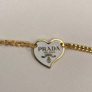 white and gold reworked prada necklace